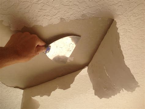 Repairing a damaged untextured ceiling is simpler than trying to match. Drywall Repair | Paint Revolution