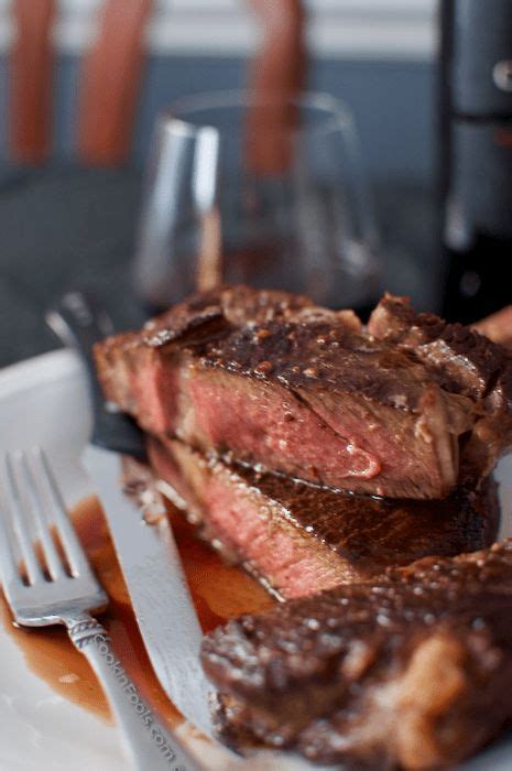 Tilt the skillet toward you and scoot the steak to the far end of the pan so that the garlic and rosemary slide down into the foaming butter pooling at the front edge. Butter Basted Cowyboy Rib Eye | GrillinFools in 2020 (With ...