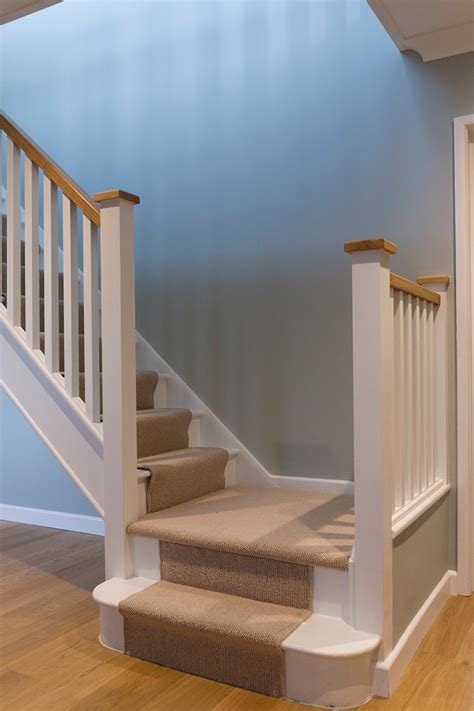 Really the only place when you think about it you actually touch when going up and down the stairs, is the hand railing, not the spindles. Painted Spindle Staircase Renovations - Hambledon Staircases