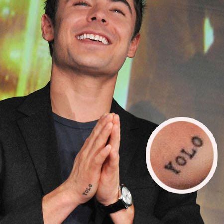 Zac efron passes through airport security despite having. Zac Efron's YOLO Tattoo.... So tempting yet so something I ...