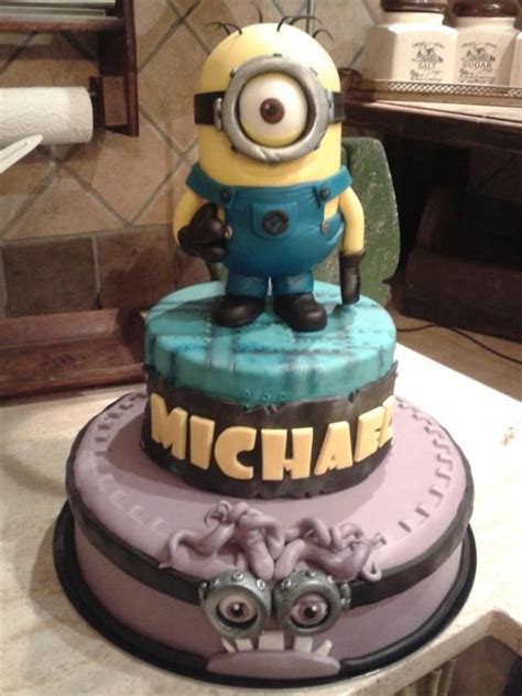 We did two chocolate layers and two yellow cake layers. Minions Cake !!! | Minion cake design, Cake, Cupcake cakes