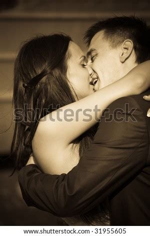 Husband&wife's profile including the latest music, albums, songs, music videos and more updates. New Husband And Wife Kissing In Romantic Hug Stock Photo ...