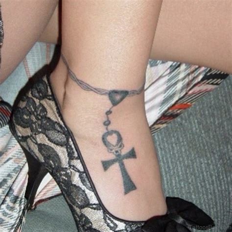 Pretty rose and cross tattoo. 63 Cool Rosary Tattoos On Ankle