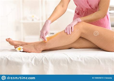 Patient comfort is one of our top. Woman Having Hair Removal Procedure On Leg With Sugaring ...