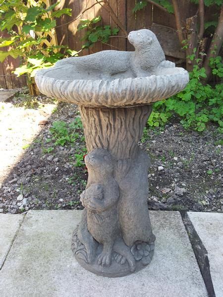 Choose your favorite lawn ornament designs and purchase them as wall art, home decor, phone cases, tote bags, and more! Otter Bird Bath | Bird bath, How to make ornaments, Garden ...