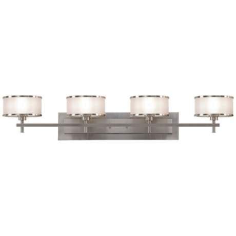 There is a clear plastic piece. Bathroom Light Bars Brushed Nickel - Bathroom Decor