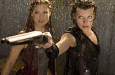 guns girls gun evil resident jovovich milla larter ali yvonne afterlife 2010 movie shotgun surrenders movies weapons film