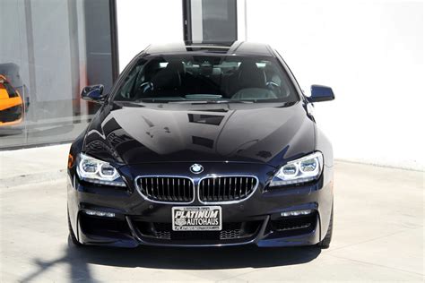 Used 2018 bmw 6 series 650i with rwd, m sport package, driver assistance package, driver assistance plus package, navigation system, keyless entry, fog lights, leather seats, heated seats, bucket seats, and blind spot monitor. 2015 BMW 6 Series 650i Gran Coupe ** MSRP $111,545 ...