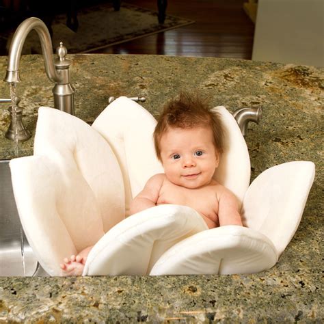 Babies love water and being with their mother can make them feel safe and secure as well. Blooming Bath - Convenient way to bathe Baby | Home Designing