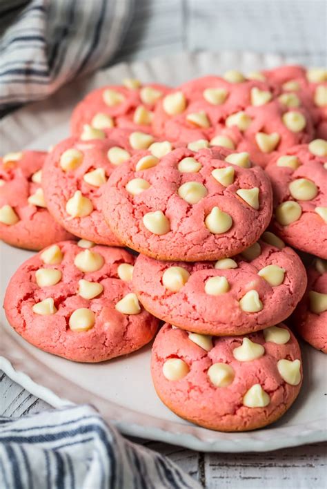 This easy cake mix cookie recipe creates the perfect little festive addition to your christmas dessert. Strawberry Cake Cookies With Hershey Kisses / Easy Cake ...