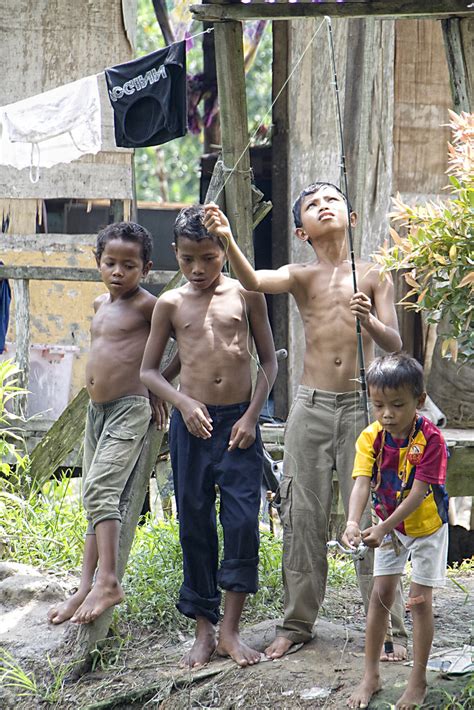 Applicants are reviewed on a rolling basis; Malaysia, Truly Asia - Orang Asli's boys fishing in the po ...