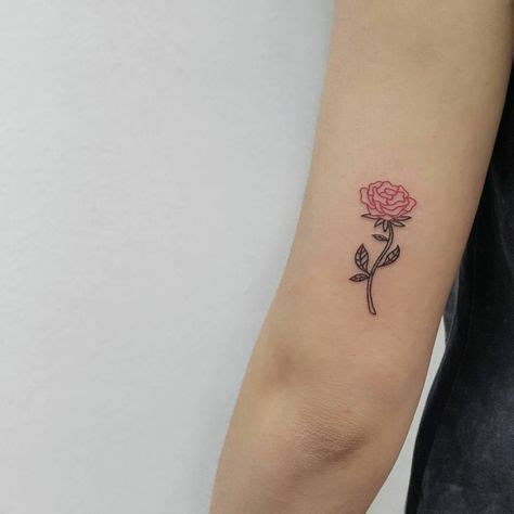 A heart and snowflake based design. Pink tattoo: 20 concepts for a classy and minimalist ...