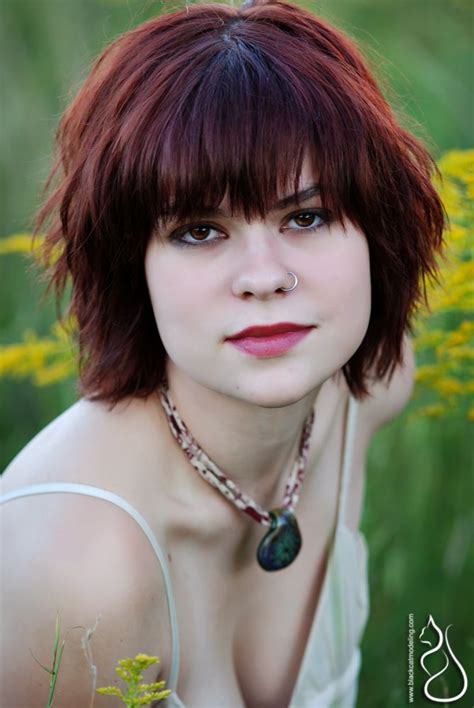 Maybe you would like to learn more about one of these? Melodie in a field for her headshot Black Cat Modeling ...