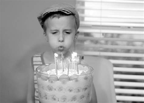 blowing out candles - Raising Roberts