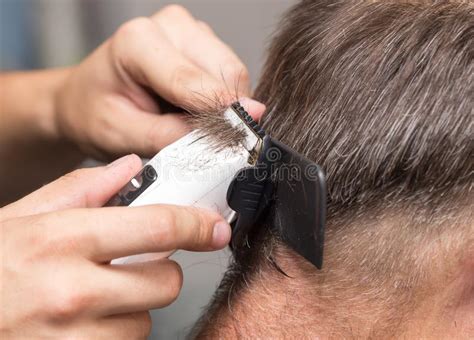 Shop for hair clippers in trimmers & groomers. Close Up Of A Male Student Having A Haircut With Hair ...