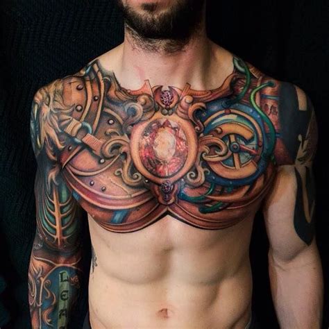 Shoulder tattoos can be symbolic and deeply significant too. Full Sleeve Armor and Chest Tattoo by Steven Mckenzie ...