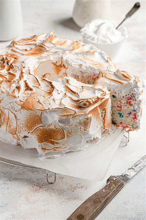 Homemade angel food cake is worth the work. Funfetti angel food cake loaded with rainow sprinkles ...