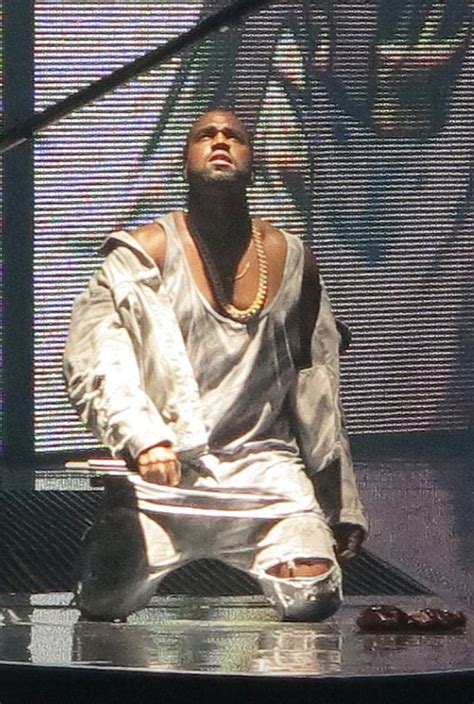He looked to be having an intense phone call. Kim Kardashian wears same look for THIRD time in a week at Kanye West show | Daily Mail Online