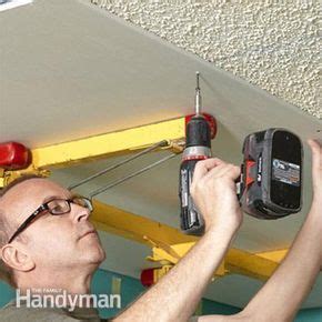 Remove popcorn ceiling by scraping, or cover it with drywall. Why Remove Popcorn Ceiling When You Can Cover It With ...