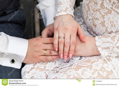 The couple had been wed only hours when the groom was passed. Picture Of Man And Woman With Wedding Ring. Stock Photo - Image of groom, girl: 116386842