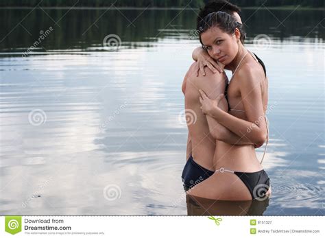 April and madison are having a relaxing time at the resort. Wet Couple Royalty Free Stock Photography - Image: 9151327