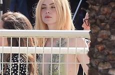 elle fanning sexy sideboob cannes premiere parties talk girls flash posted braless celebmafia