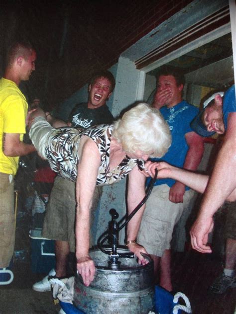 Two dudes have fun with granny. Grandma's Keg Stand