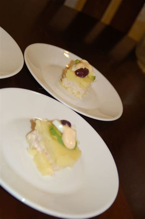 Party appetizer sandwiches made with ham, turkey and cheese baked in a buttery topping dusted with powdered sugar just like. Peruvian Causa | Dinner party, Food, Dinner