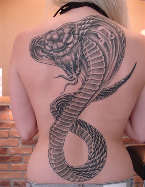 This tattoo has the again, this is not only to see, but feel what the tattoo can give from the picture of the curves that. 12 Awesome Tribal Snake Tattoos