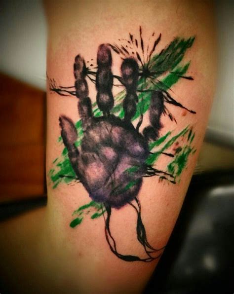 Best custom tattoos in gainesville. Child's handprint inner arm trash polka tattoo by Josh ...