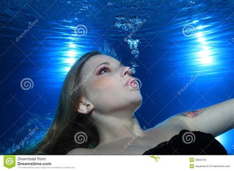 An undersea home has certain pros and cons that set it apart from any other sort of base. Woman Underwater Stock Image - Image: 29833761