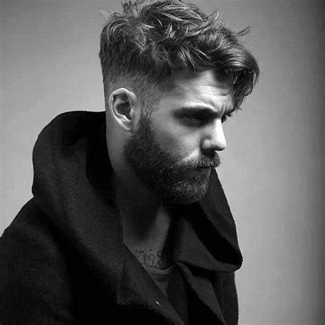 Este estilo ideal para lucir rizos naturales. Mid Fade Corte De Pelo Taper Bajo - Peinados