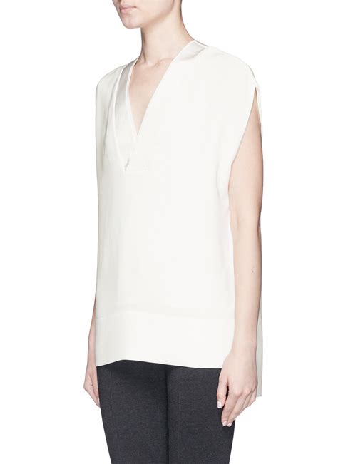 See more ideas about satin blouse, satin blouses, blouse. Vince Satin Trim V-neck Crêpe Blouse in White - Lyst