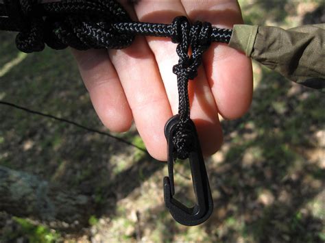 Short bungee cord loops for an easy and cozy fix to your hammock. Hamac Hennessy Hammocks Camo Evader asym