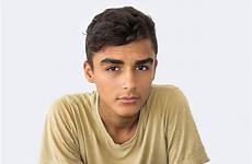 arab cute boy teenage guys camera stock
