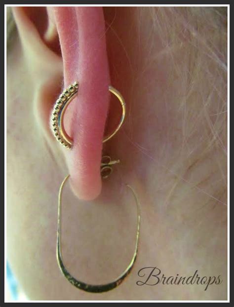 Body modification has taken on vastly different meanings over the years, from wearing makeup and piercing our ears to getting tattoos and going to tanning salons. Custom made gold Latchmi from BVLA for a healed orbital ...