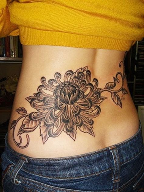 These lower back tattoos are commonly known as tramp stamps because they were generally only sported by the less here the back tattoos tribal design is worked into a triangle. 100 Lower Back Tattoo Designs for Women: 2016