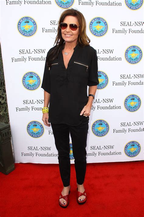 Sahra with legs behind her neg. Sarah Palin's Feet