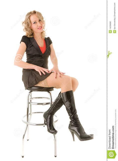 Some causes are specific to women, like pms or endometriosis, while other causes can happen to anyone. Beautiful Woman Sitting On The Bar Chair Stock Photo ...