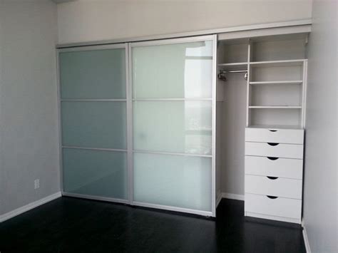 Lemari baju pintu geser klasik modern kode : Lemari Aluminium 3 Pintu Geser - LEMARILA