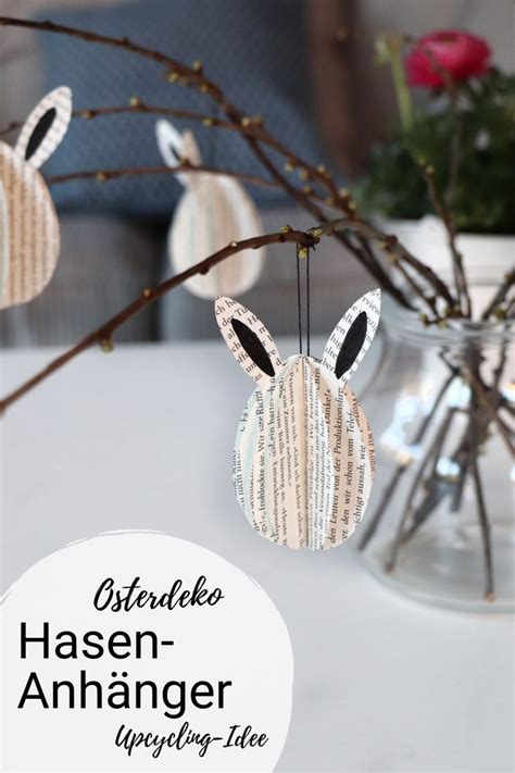Aus starker pappe schablonen für die osterhasen ausschneiden. DIY: Osterhasen-Anhänger aus alten Buchseiten basteln ...