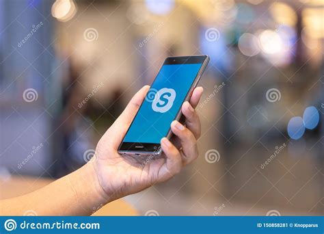 Browse your apps until you find skype for business, and then tap the icon to open the app. CHIANG MAI, THAILAND - Oct. 28,2018: Man Holding HUAWEI ...