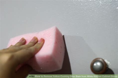 Use a paint brush with natural fibers to apply a thick, even layer of the stripper to the surface. How to Remove Yellow Cooking Odor Stain from White Kitchen ...