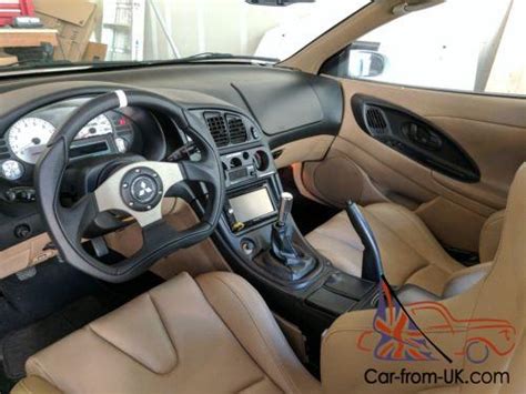 There's way too much done to this car for me to list everything. 1999 Mitsubishi Eclipse GSX