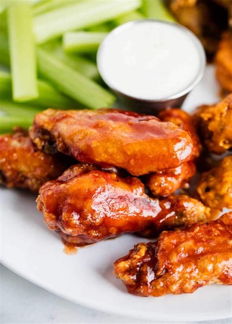 The plain chicken, still on the left, is shinier than the baking powdered wings. EASY Crispy Baked Chicken Wings - I Heart Naptime | Recipe | Chicken wings, Crispy baked chicken ...