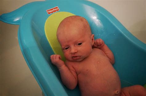 Baby bath — understand the basics, from testing water temperature to holding your newborn securely. Life After I Do: Baby Kaylee {1 Month Old}