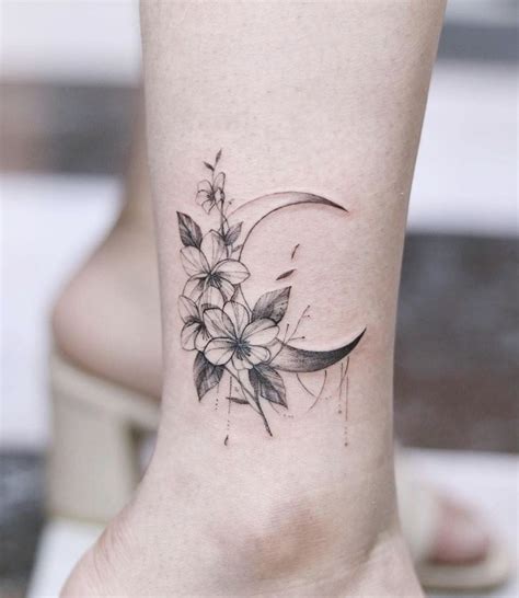 May is most notable for being the turning point in the year where temperatures rise and a vast variety of flowers come into full bloom, letting the world break out into a riot of color. moon & flowers . . . #애리타투 #tattoo #tattoos #tattooed # ...