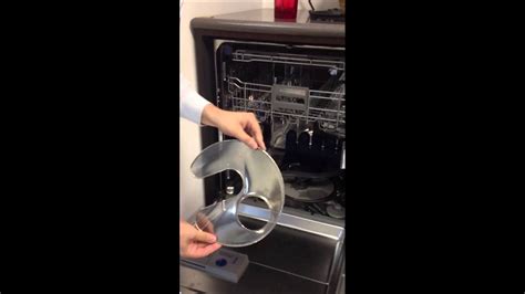 Yep, it's time to empty that filter. KitchenAid Dishwasher Filter - YouTube