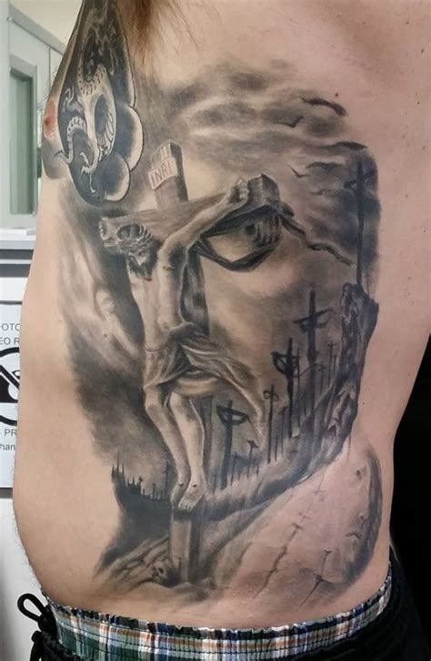 The shop is a favorite for the artistic take on the art of tattooing and offers a variety of artists to appeal to. Surrealistic Jesus by Jonathon Anderson - Tattoo.com