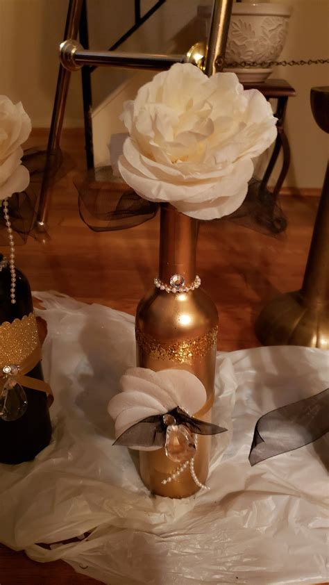 Each kit contains enough pieces to jazz up one table or spread the love among three tables. Black and gold birthday party wine bottle centerpiece ...